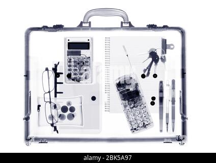 Briefcase with various items, X-ray. Stock Photo