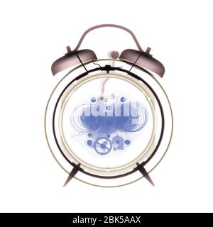 Alarm clock, coloured X-ray. Stock Photo