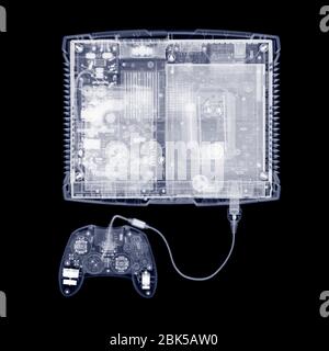 Games console and joy pad, X-ray. Stock Photo