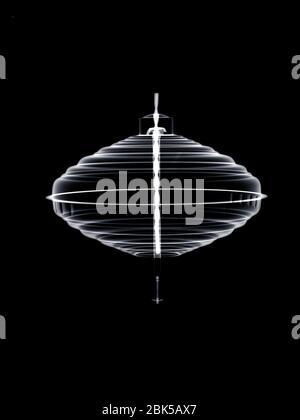 Mechanical spinning top, X-ray. Stock Photo