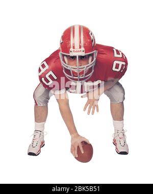 American football player, coloured X-ray. Stock Photo