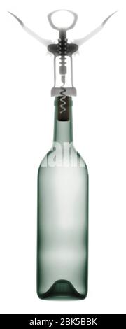 Corkscrew and wine bottle, X-ray. Stock Photo