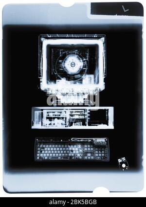 Film of personal computer and keyboard, X-ray. Stock Photo