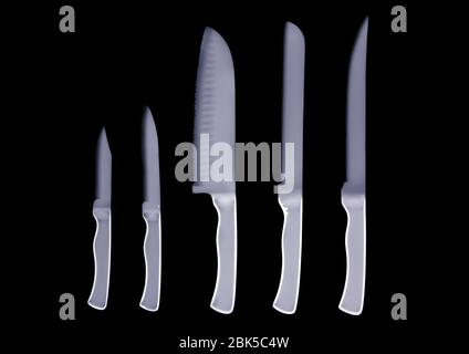 Row of knives, X-ray. Stock Photo