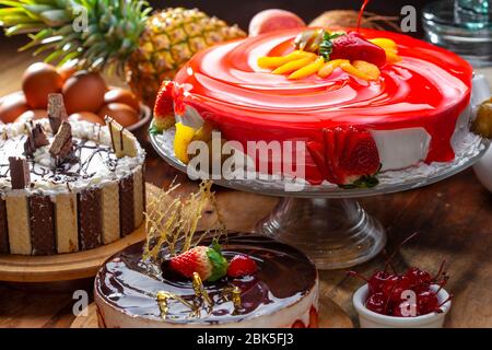 strawberry and fig pie with cashew nuts on decorated table. Stock Photo