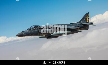 A U.S. Marine Corps AV/8B Harrier assigned to the 26th Marine Expeditionary Unit, prepares to conduct an aerial refuel from a KC-130J Super Hercules assigned to Marine Aerial Refueler Transport Squadron 352 (VMGR-352), Special Purpose Marine Air-Ground Task Force – Crisis Response – Central Command (SPMAGTF-CR-CC) 19.2, in the US Central Command area of responsibility, April 28, 2020. The SPMAGTF-CR-CC is a crisis response force, prepared to deploy a variety of capabilities across the region. (U.S. Marine Corps photo by Sgt. Branden J. Bourque) Stock Photo