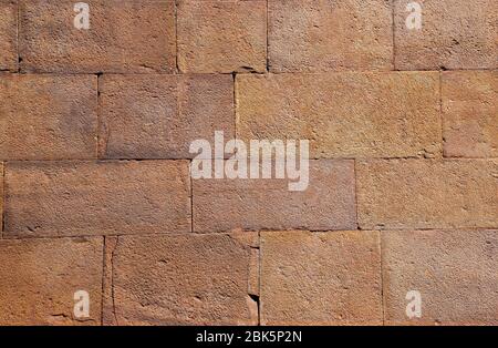 Pinkish-Yellow brick wall texture background Stock Photo