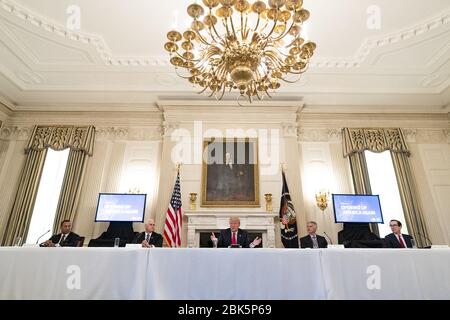 Washington, United States Of America. 29th Apr, 2020. President Donald J. Trump delivers remarks during a roundtable with industry executives to discuss a plan to reopen America Wednesday, April 29, 2020, in the State Dining Room of the White House. People: President Donald Trump Credit: Storms Media Group/Alamy Live News