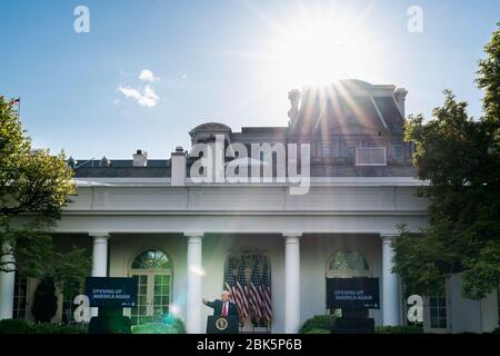 Washington, United States Of America. 27th Apr, 2020. President Donald J. Trump takes questions from reporters during a coronavirus update briefing Monday, April 27, 2020, in the Rose Garden of the White House People: President Donald Trump Credit: Storms Media Group/Alamy Live News Stock Photo