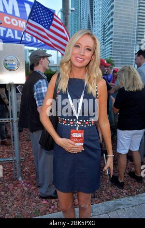 MIAMI, FLORIDA - JUNE 26: (EXCLUSIVE COVERAGE) President Trumps Newly appointed White House Press Secretary Kayleigh McEnany joins Protesters outside prior to the first 2020 Democratic presidential debate including New York police officers that are protesting New York Mayor Bill de Blasio. A field of 20 Democratic presidential candidates was split into two groups of 10 for the first debate of the 2020 election, taking place over two nights at Knight Concert Hall of the Adrienne Arsht Center for the Performing Arts of Miami-Dade County on June 26, 2019 in Miami, Florida People: Kayleigh McEn Stock Photo