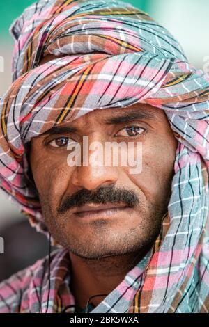 Portrait of Omani fishermen in traditional Omani masar head scarf in Khasab, Oman Stock Photo