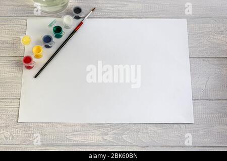 Paper crafts for children. Application of children's creativity.  Kindergarten and craft school. On a beige background, a funny face of a man  made of colored paper. 18906892 Stock Photo at Vecteezy