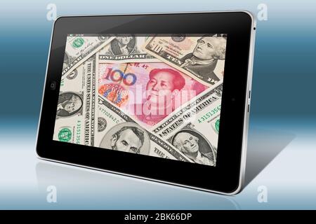 Many U.S. Dollar bills lying side by side. In the middle lies a Chinese 100 Yuan bill with the portrait of Mao Zedong. Stock Photo