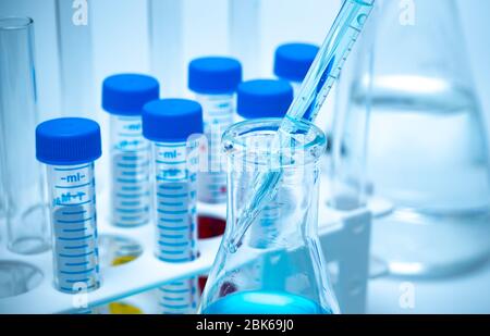 Close-up of the test tube on a blue background Stock Photo