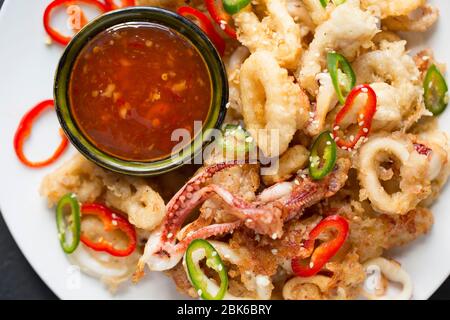 Fried squid tentacles Stock Photo - Alamy