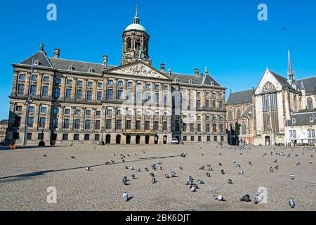 City scenic from Amsterdam at the Dam Square with the Royal Palace in the Netherlands Stock Photo