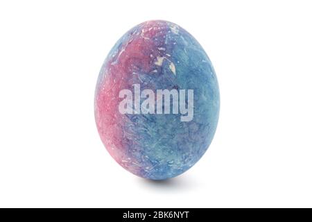 Cosmic painted chicken egg isolated on white background. Stock Photo