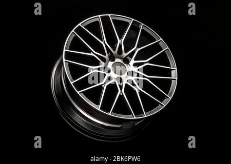 black alloy wheels, aluminum disc sport with a carbon fiber cover. Light weight and modern cool design. Stock Photo