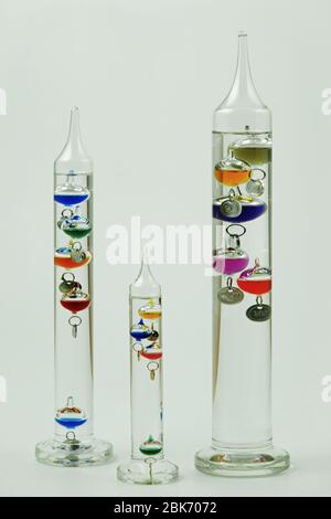 Galileo thermometer or Galilean thermometer, glass cylinder, several ...