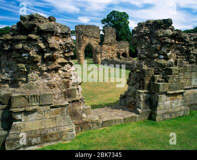 Basingwerk Abbey, West Door to Lay Brothers Nave and South Aisle, South Transept arch and Chapter House. North Wales.   Basingwerk Abbey, Looking thr Stock Photo