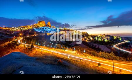 Uchisar Castle at night in Cappadocia, Turkey. Stock Photo