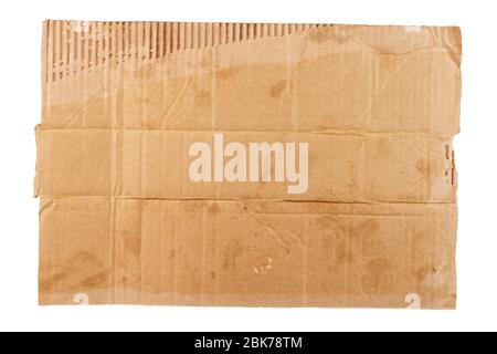 isolated on white sheet of blank dirty piece of cardboard - homless plackard mockup Stock Photo