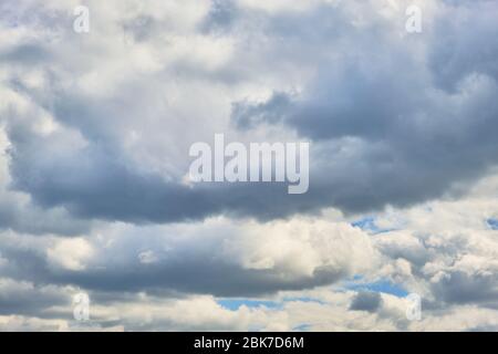 Background, storm clouds illuminated by sunlight Stock Photo