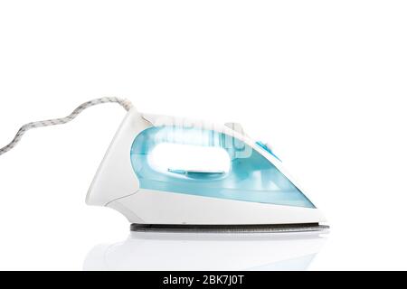 Modern electric iron isolated on the white background Stock Photo