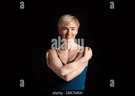 Different, but beauty woman crossing arms on her chest Stock Photo