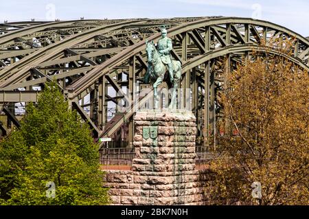 Equestrian statue of Emperor Wilhelm II on the Hohenzollern Bridge in Cologne. The bronze sculpture by the sculptor Louis Tuaillon was one of four statues of monarchs erected on the bridge in 1911–12. Cologne, North Rhine-Westphalia, Germany Stock Photo