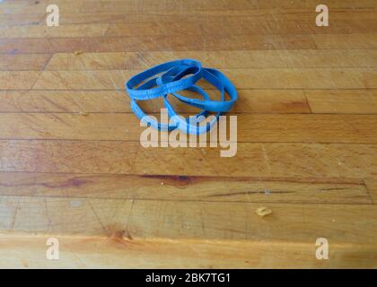 Rubber bands imprinted with Price Look-Up code #4080 and Produce of ...