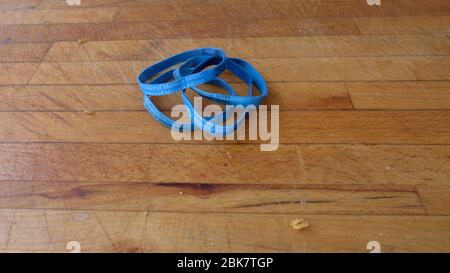 Rubber bands imprinted with Price Look-Up code #4080 and Produce of ...