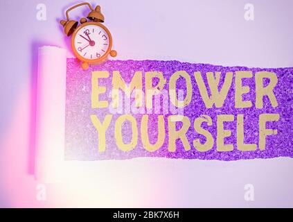 Conceptual hand writing showing Empower Yourself. Concept meaning taking control of life setting goals positive choices Stock Photo