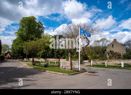 Village flag pole showing support for the NHS during the coronavirus pandemic Stock Photo