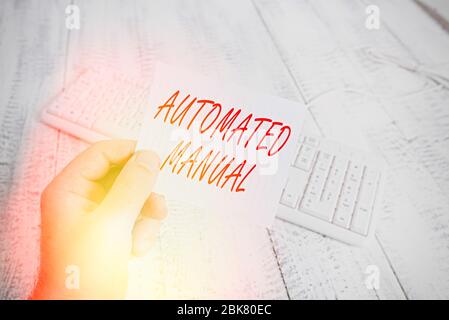 Word writing text Automated Manual. Business photo showcasing as trigger shift and it can switch between moods easily man holding colorful reminder sq Stock Photo