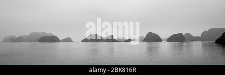 Sailing though Ha Long bay Stock Photo