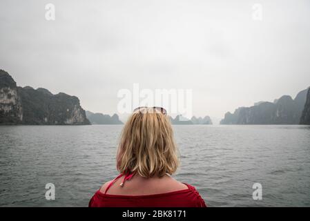 Sailing though Ha Long bay Stock Photo