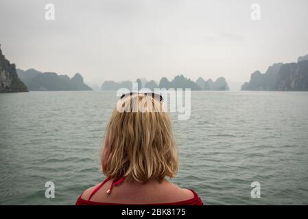 Sailing though Ha Long bay Stock Photo