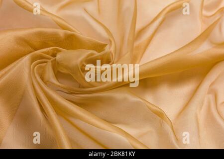 Shiny cloth background with beige vial textile transparent light gentle fabric Stock Photo