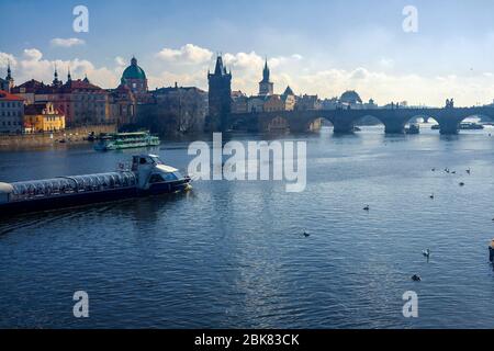 View of the Vltava River and the bridges shined with the sunset sun, Prague, the Czech Republic Stock Photo