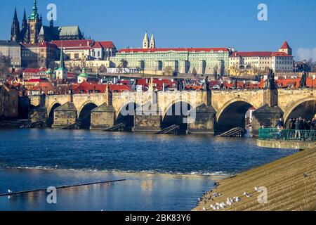 View of the Vltava River and the bridges shined with the sunset sun, Prague, the Czech Republic Stock Photo