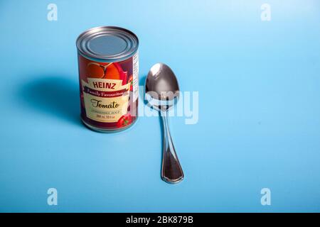 April 11, 2020 - Halifax, Canada: A tin of Heinz brand condensed tomato soup and a spoon Stock Photo