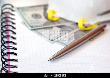 Luxury Pen Protective Mask And Usa Dollars Bank Notes On A White Paper Copybook Background Financial Crisis And Coronavirus Global Pandemia Shallow Stock Photo Alamy