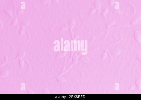 Light pink paper with embossed flowers pattern Stock Photo