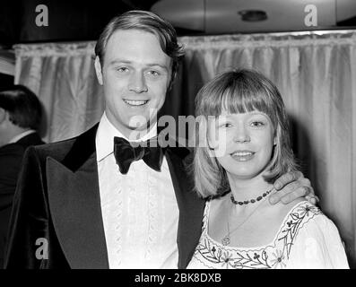 LONDON, UK. June 26, 1974: Actor Christopher Cazenove & wife actress Angharad Rees attend the premiere of 'Mame' at the ABC Shaftesbury Avenue, London.  File photo © Paul Smith/Featureflash Stock Photo