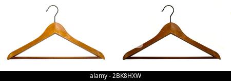 Two wooden coat hangers of different colours dark and light isolated on white background. Fashion retail concept Stock Photo