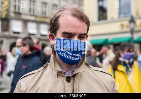 Munich, Bavaria, Germany. 2nd May, 2020. Markus Wallbrunn of the AfD at a conspiracy demo in Munich, Germany. On the heels of a violent attack against ZDF journalists in Berlin, the Munich Hygienedemos took place again, complete with conspiracy theorists, right-extremists, neonazis, Hooligans, AfD members, insults and aggression towards journalists and police, and violations of the infection protection laws. Organized in Telegram chats by conspiratorial 'Querfront'' (cross-front) groups, the organizers planned several individual demos with instructions to eventually move to a central locati Stock Photo