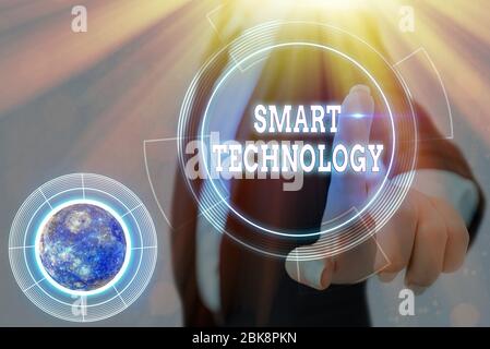 Conceptual hand writing showing Smart Technology. Concept meaning gadgets or device that has a built in computer or chip Elements of this image furnis Stock Photo