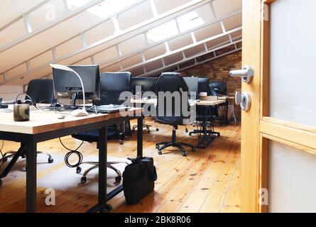 Empty interior office. Tables with computers and chairs Stock Photo