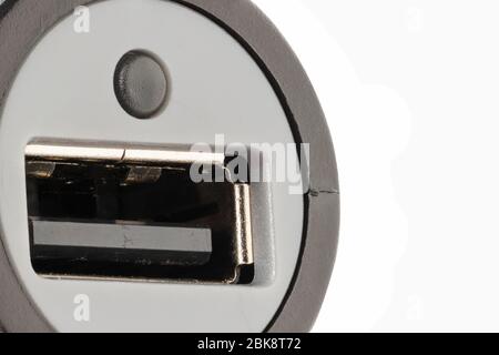 horizontal view in foreground of a car lighter charger with usb connector Stock Photo